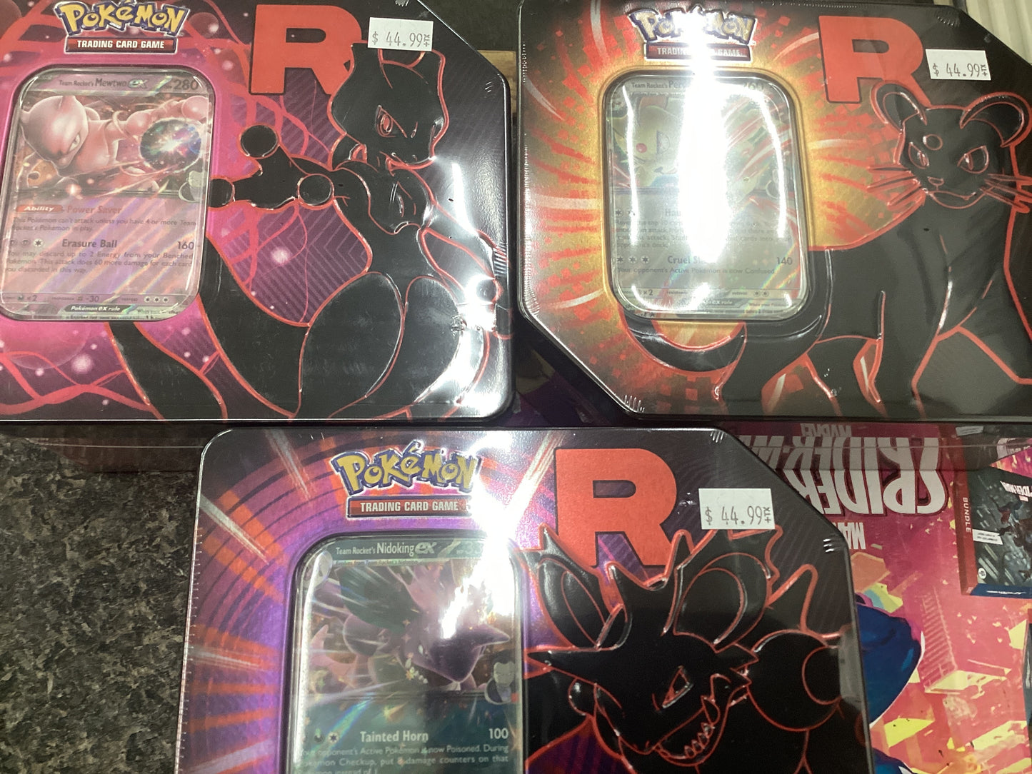 Team Rocket Tin
